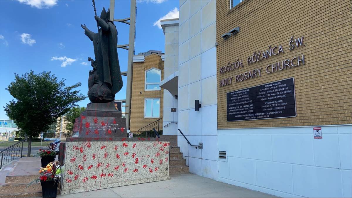 A statue of Pope John Paul II outside the Holy Rosary Catholic Church at 11485 106 St. was vandalized with red paint on Saturday, June 26, 2021.