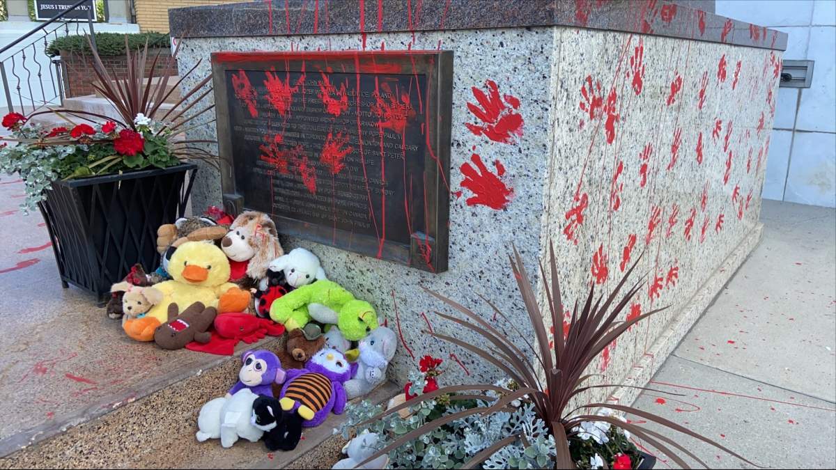 A statue of Pope John Paul II outside the Holy Rosary Catholic Church at 11485 106 St. was vandalized with red paint on Saturday, June 26, 2021.