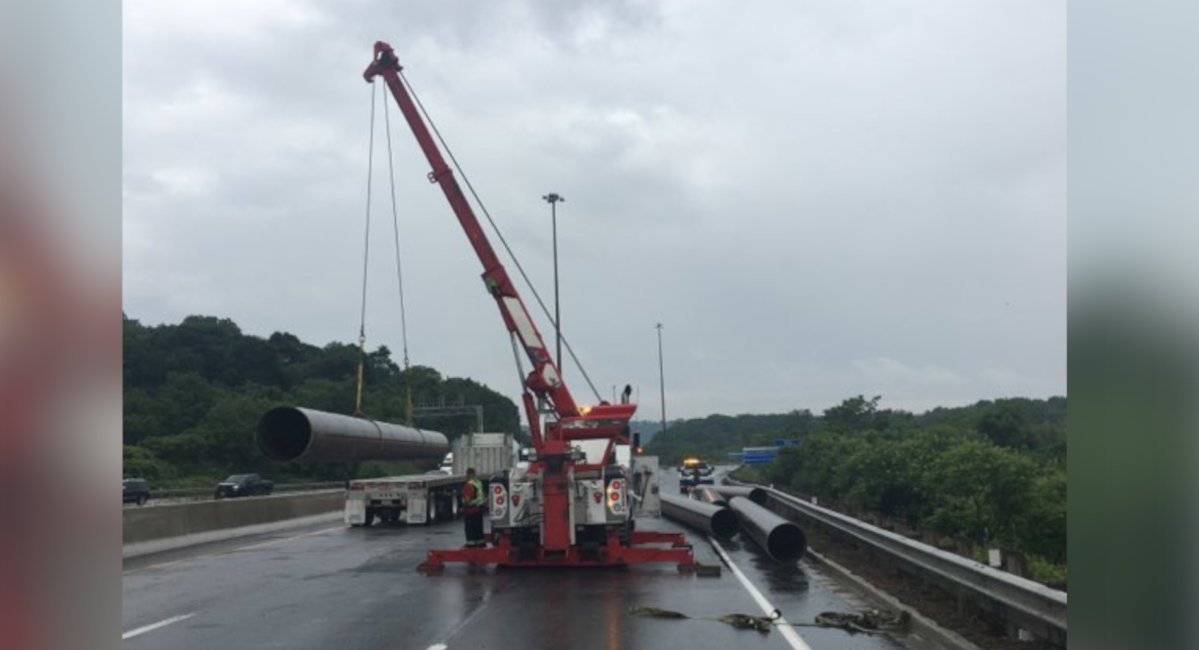 OPP say a transport truck lost a load on Highway 403 westbound into Hamilton on June 18, 2021.
