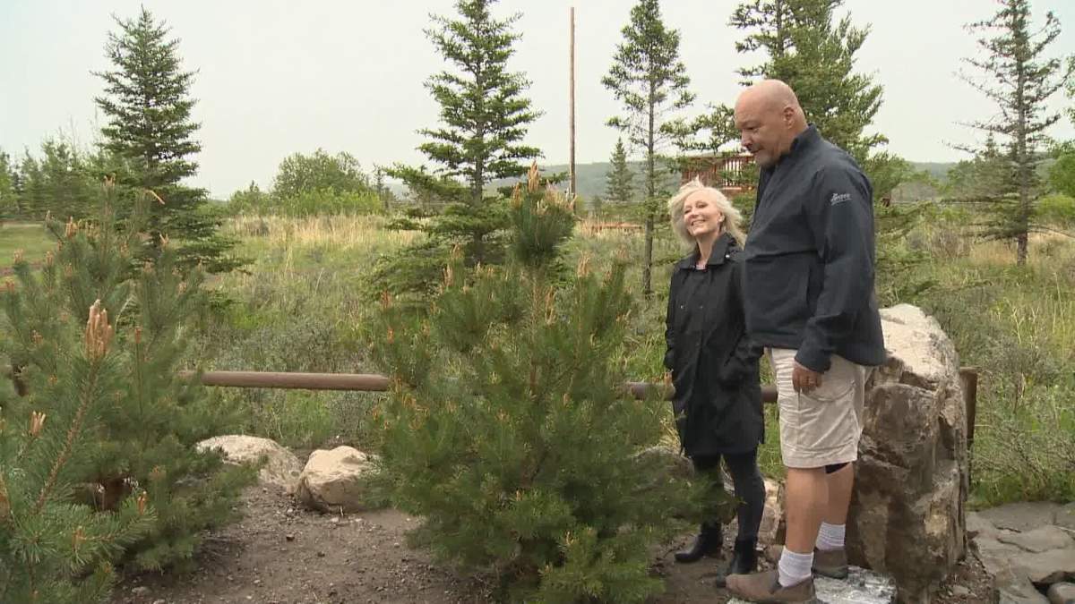 Mike and Lisa Heier outside their recreational home in Alberta.