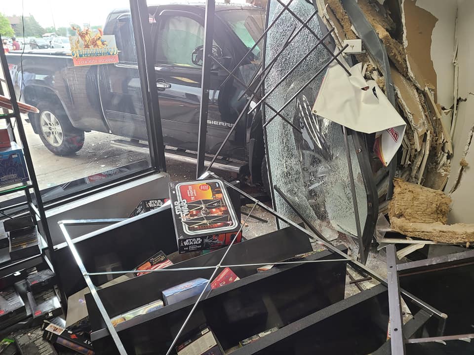 Kingston police say the driver of the vehicle lost control of the truck and crashed it into the front of SBT Comics and Games in the city's west end.