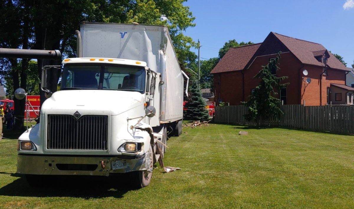 Police are investigating after a transport truck collided with a house in Springfield, Ont.