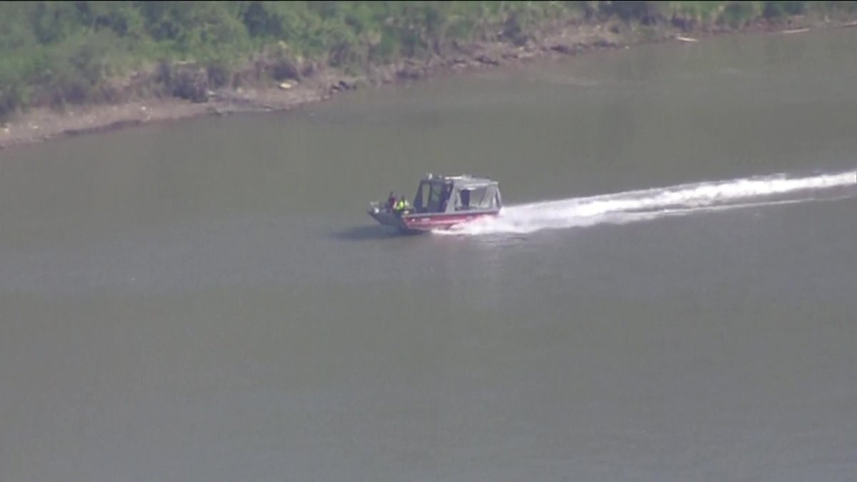 An Edmonton Fire Rescue Services search and rescue boat on the North Saskatchewan River in Edmonton, Alta. on Saturday, June 26, 2021. 
