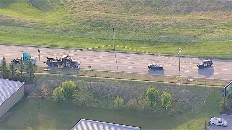Calgary emergency crews respond to a crash involving a tow truck driver on Wednesday, June 16, 2021.