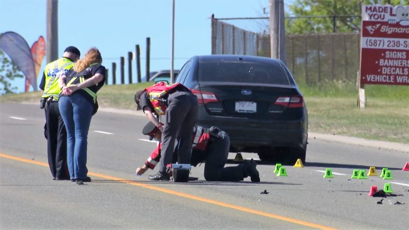 Calgary emergency crews respond to a crash involving a tow truck driver on Wednesday, June 16, 2021.