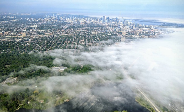 Fog can be seen rolling across west Toronto.