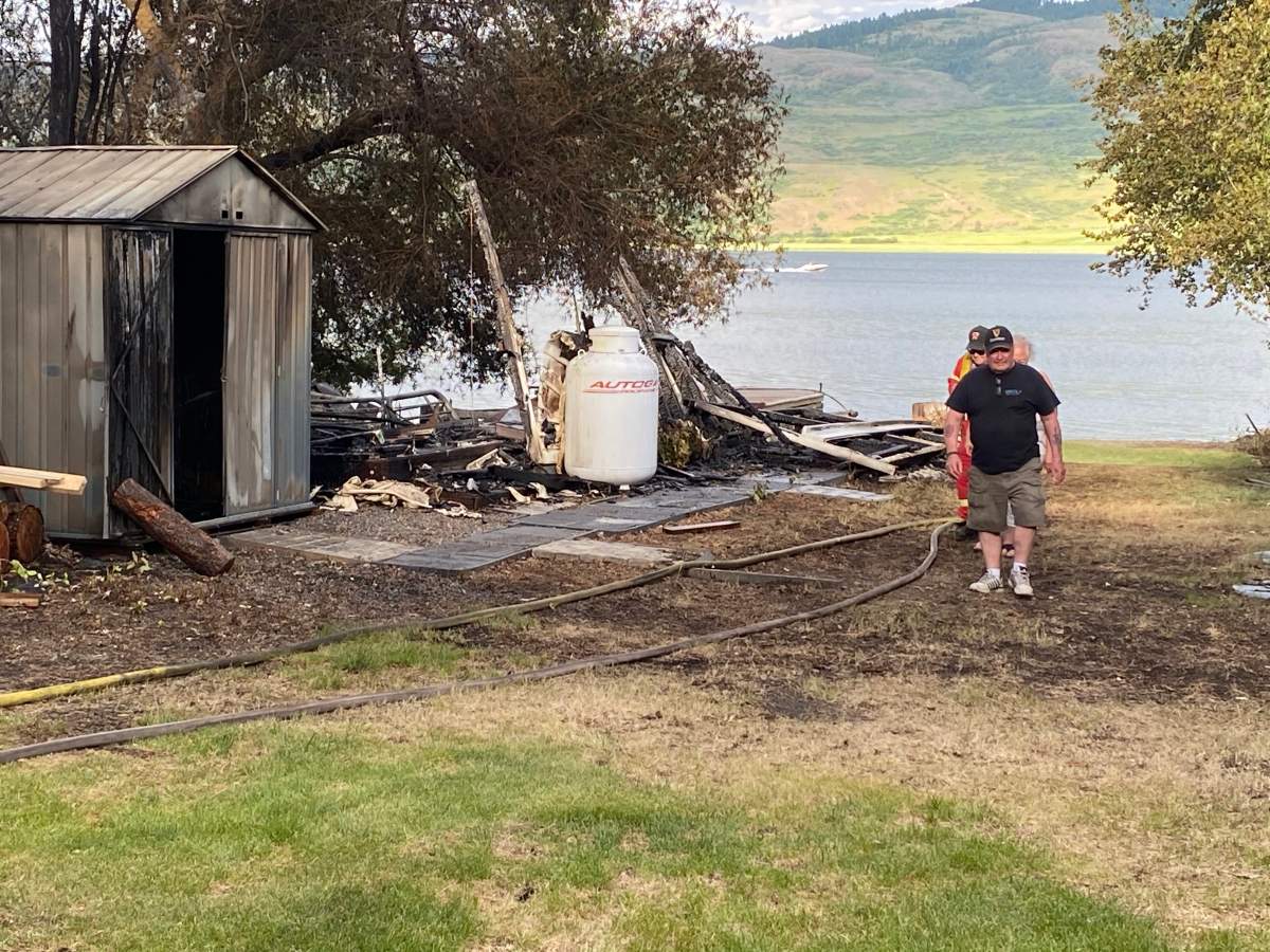 Another view of the fire from Friday that burned two trailers and three cabins.