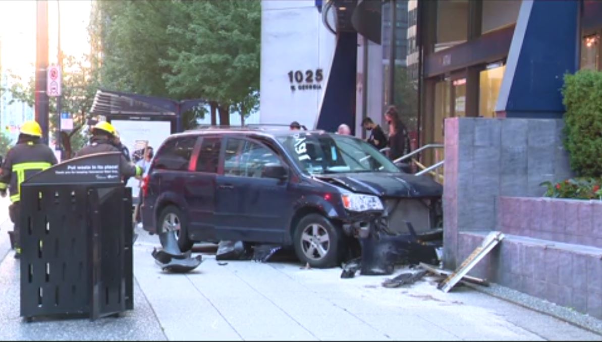 Police are investigating a crash in downtown Vancouver on June 9, 2021.