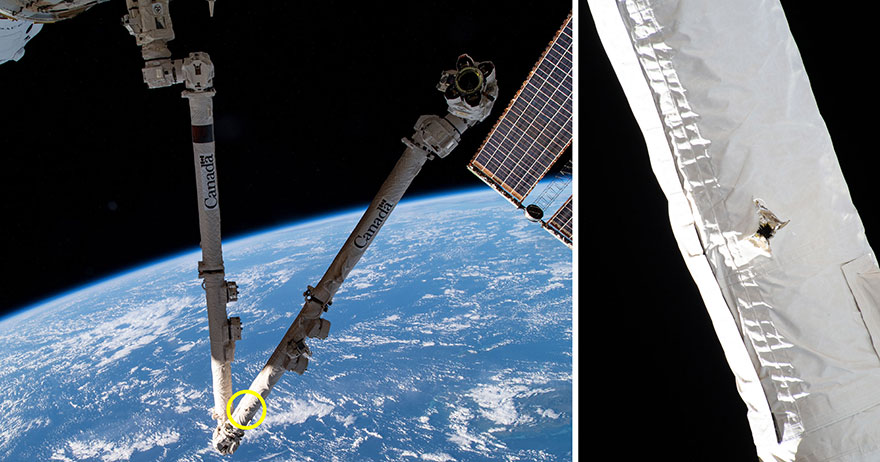 A puncture hole in the Canadarm2 is shown in this handout photo from May 2021.