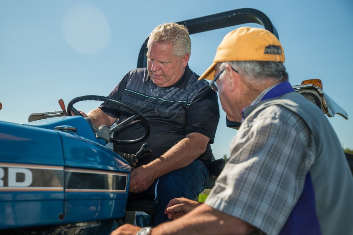Ontario Premier Doug Ford checks out his tractor at the International Plowing Match in Verner, Ont. on Tuesday, September 17, 2019. 