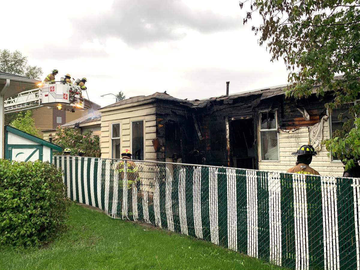 Edmonton firefighters battle a blaze at a southside home, Thursday, June 10, 2021. 