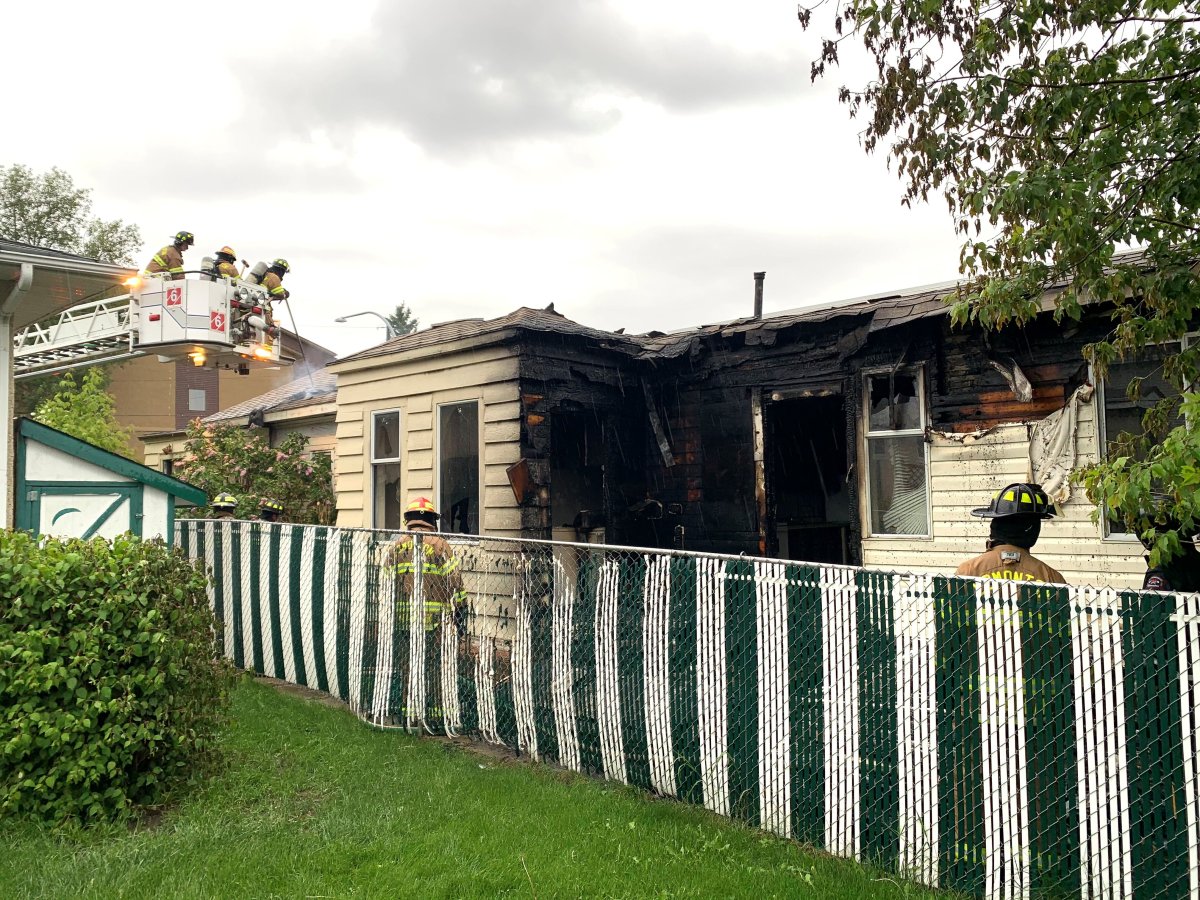 Edmonton firefighters battle a blaze at a southside home, Thursday, June 10, 2021. 