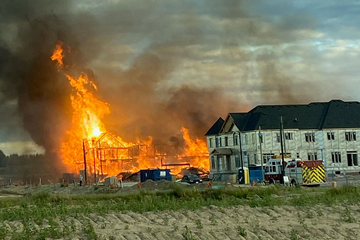 Kitchener Fire says 12 new-build homes were damaged in the fire on Tuesday night.