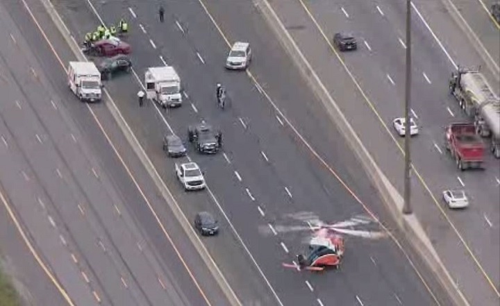 Ornge air ambulance landing on Highway 401 eastbound at Whites Road on June 25, 2021.