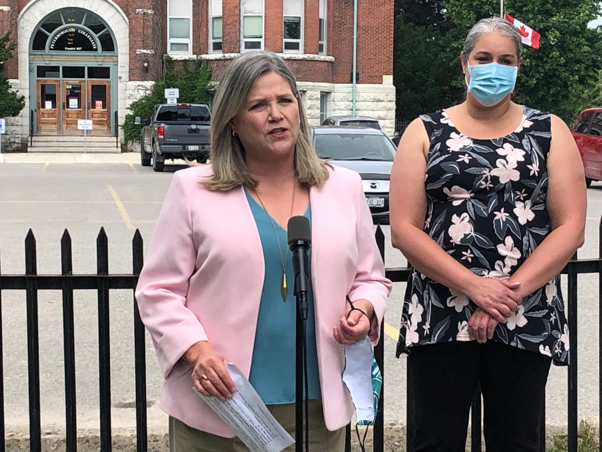 Ontario's official Opposition Leader Andrea Horwath and local Grade 3/4 teacher Erika Mark hold a news conference in Peterborough on June 29, 2021.