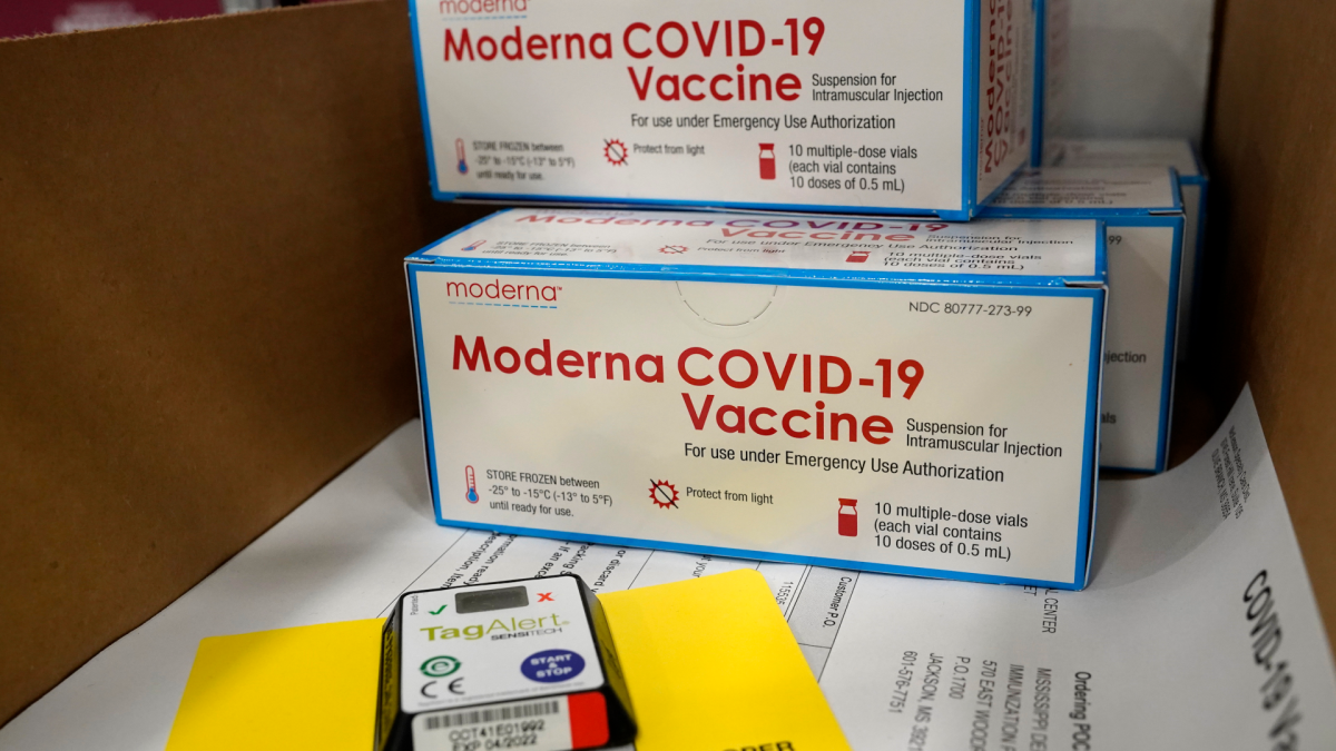 Boxes containing the Moderna COVID-19 vaccine are prepared to be shipped at the McKesson distribution center in Olive Branch, Miss., Sunday, Dec. 20, 2020. (AP Photo/Paul Sancya, Pool) .
