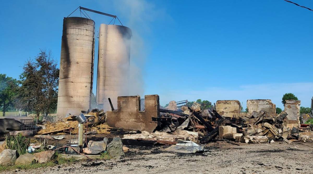 OPP say officers assisted Middlesex Centre firefighters in responding to a barn fire on Ivan Drive on June 16, 2021.