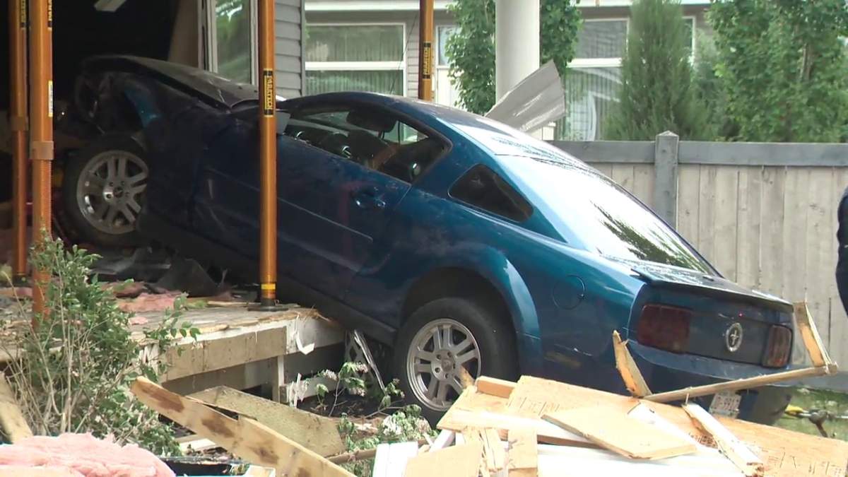 Edmonton Fire Rescue Services said the driver of a car lost control and ran into a home in Summerside Monday, June 14, 2021.