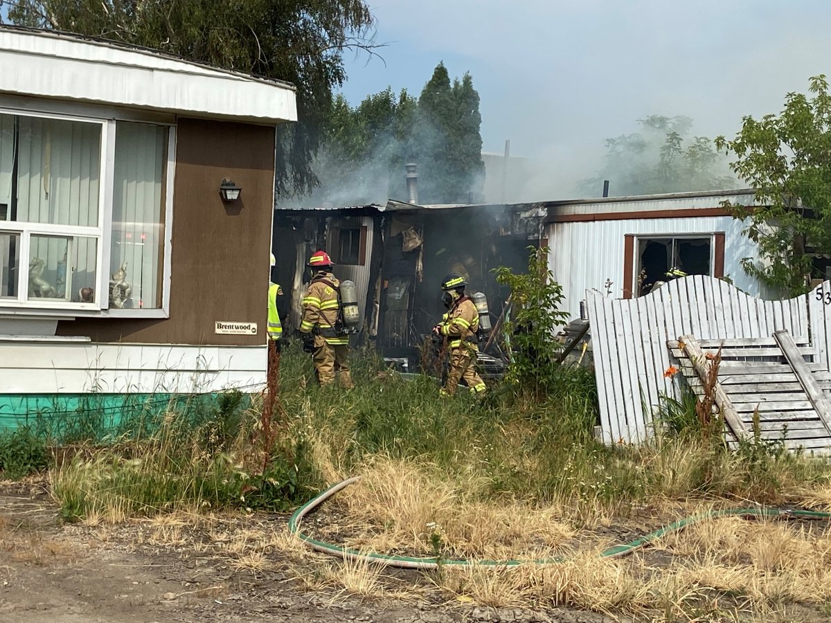 Fire at a mobile home near 45 Street and 76 Avenue Wednesday, July 14, 2021.