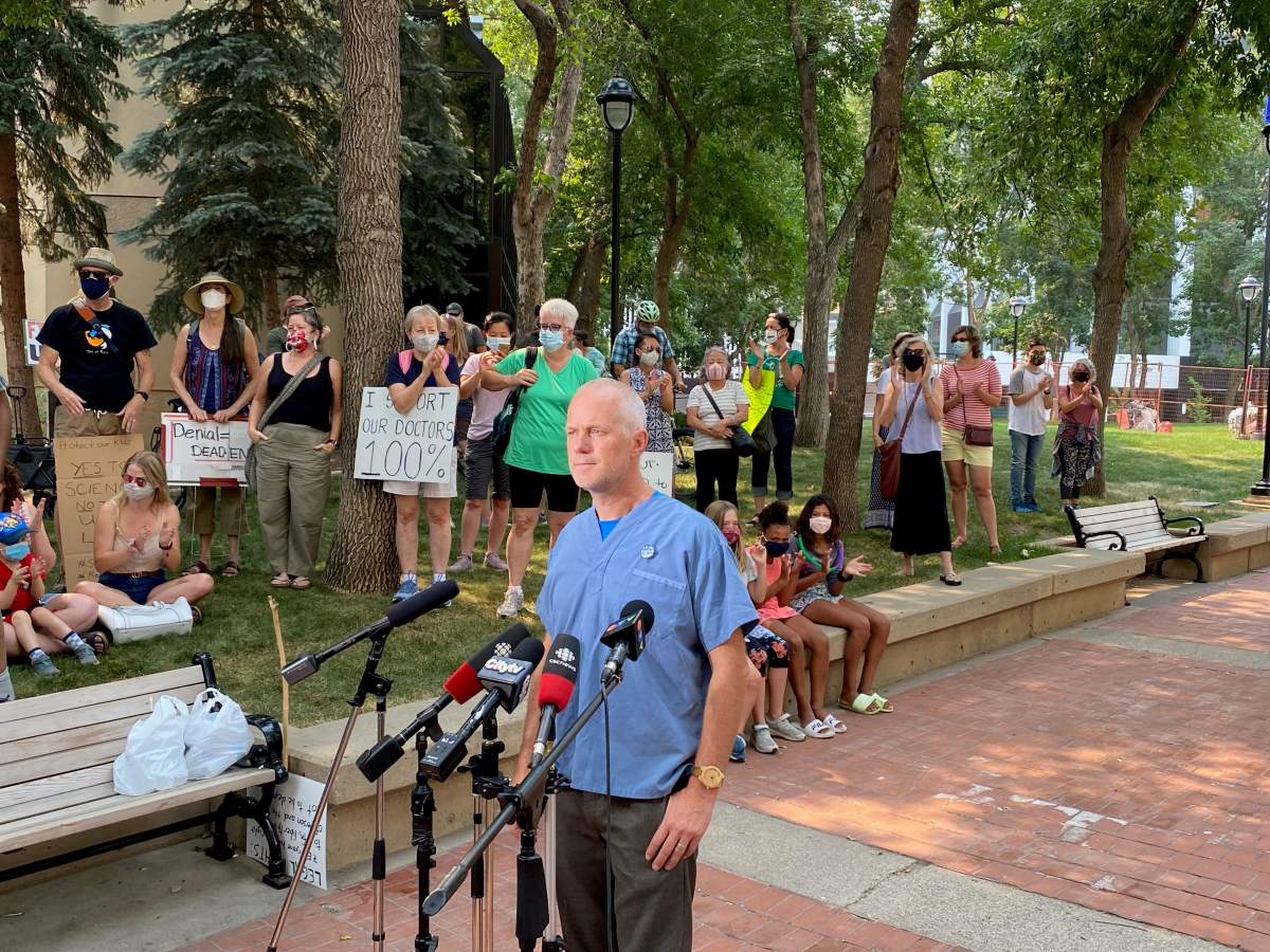 Dr. Joe Vipond, an emergency room physician, speaks at a rally at the McDougall Centre in Calgary opposing the government’s plans to lift COVID-19 isolation requirements, masking rules and change testing. July 30, 2021.