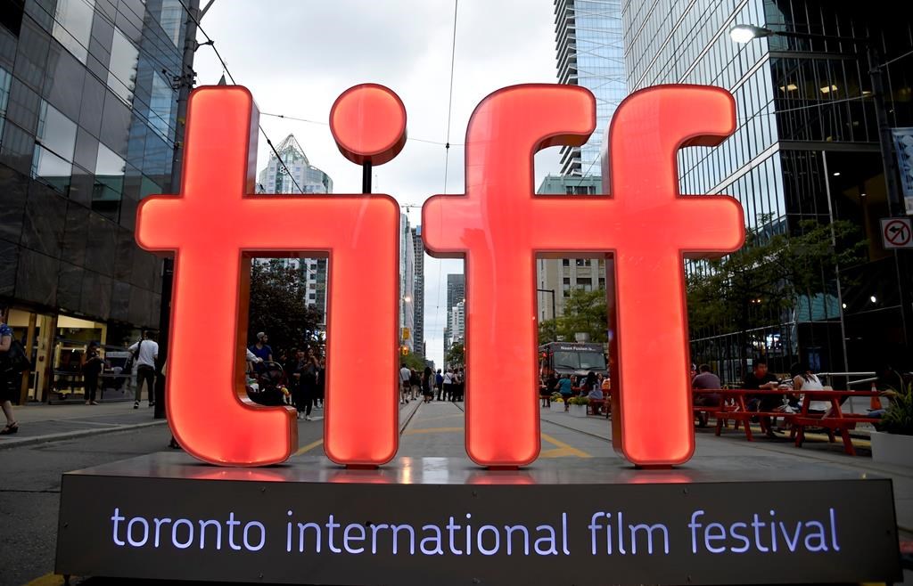 FILE - In this Thursday, Sept. 6, 2018, file photo, a view of a festival sign appears on Day 1 of the Toronto International Film Festival in Toronto. 