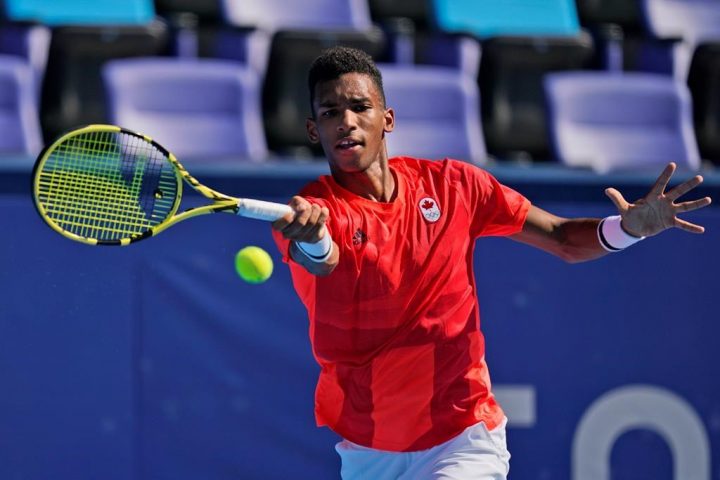 Felix Auger-Aliassime, of Canada, plays against Max Purcell, of Australia, during the first round of the tennis competition at the 2020 Summer Olympics, Sunday, July 25, 2021, in Tokyo, Japan.