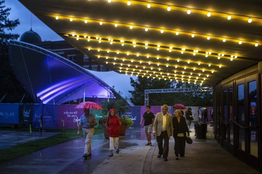Audience members make their way home after the Stratford Festival's opening night of their theatre season in Stratford, Ont., Tuesday, July 13, 2021.