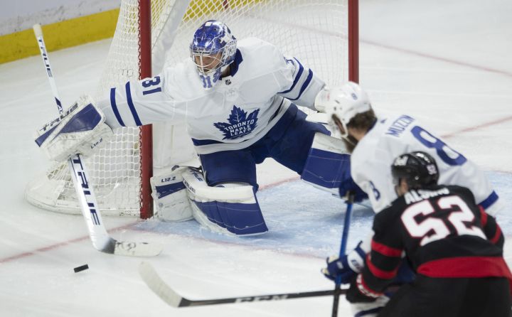 Toronto Maple Leafs goaltender Frederik Andersen deflects the puck wide of the net during second period NHL action Wednesday, May 12, 2021 in Ottawa.