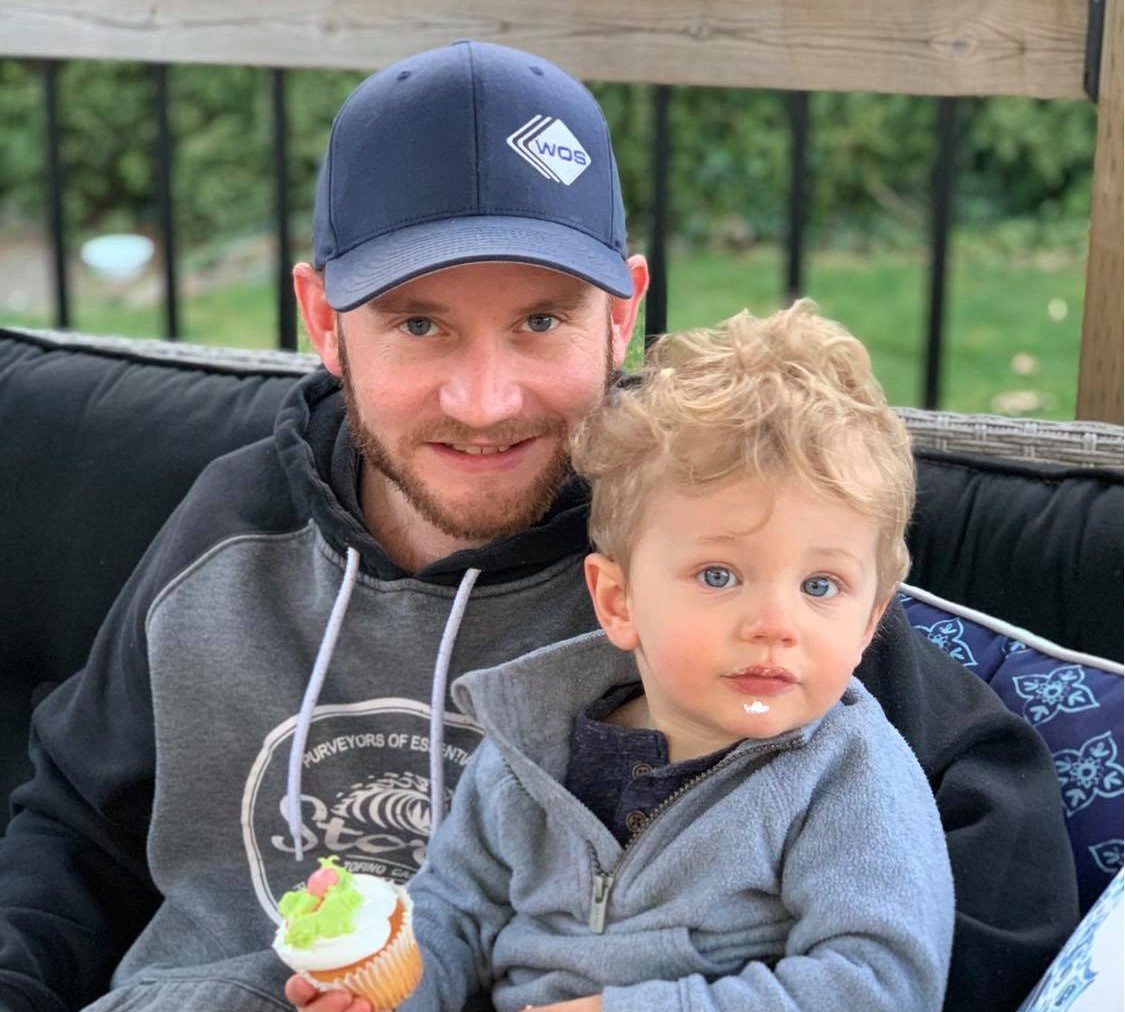 Bradley Ker is pictured with his two-year-old son.