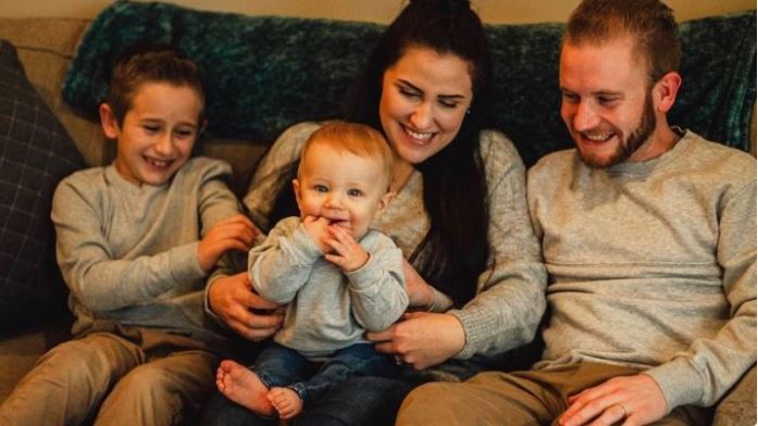 Bradley Ker (far right) pictured with his wife, his two-year-old son and 10-year-old stepson. 
