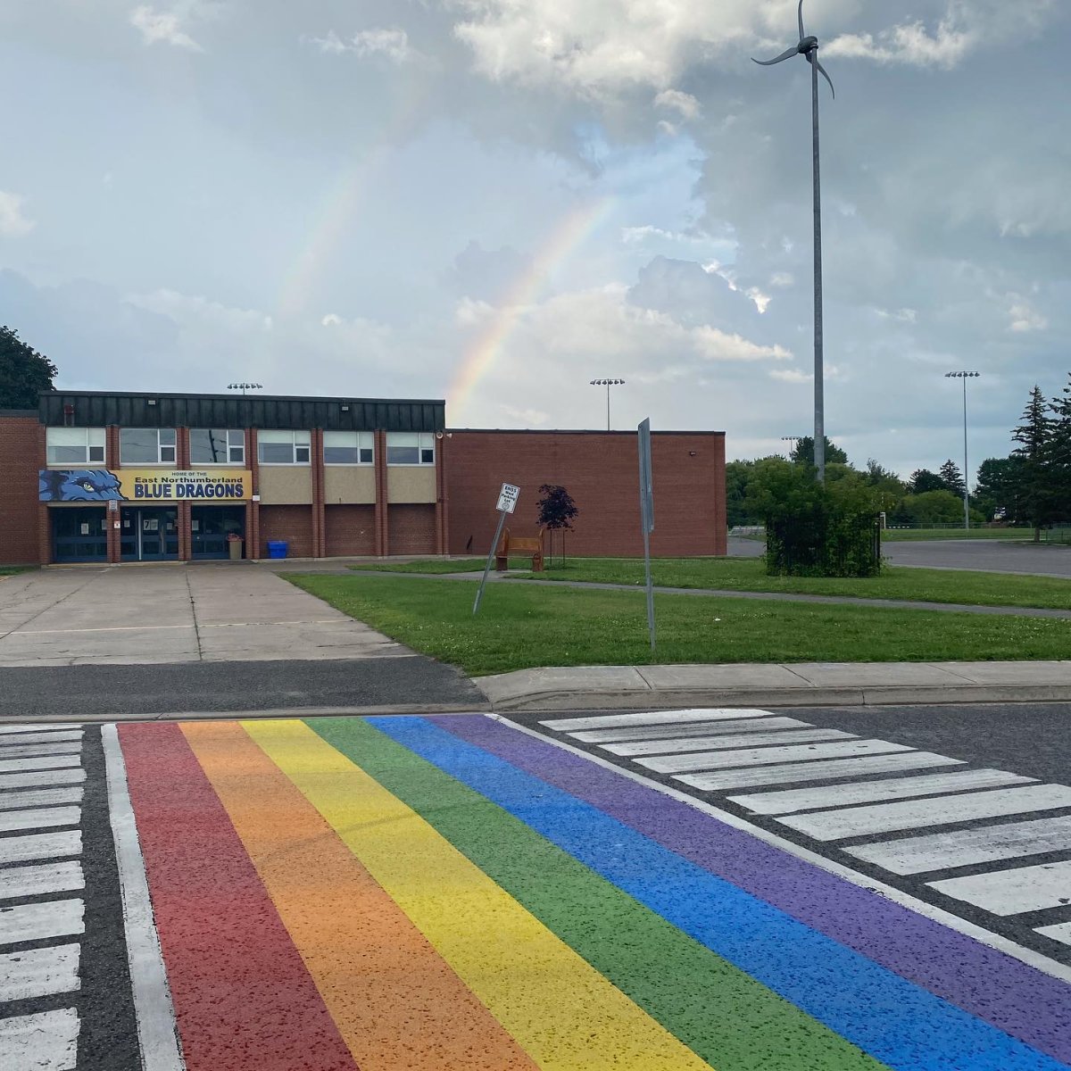 The Pride crosswalk in Brighton, Ont, seen on July 13. It was repaired after it was defaced earlier this month.