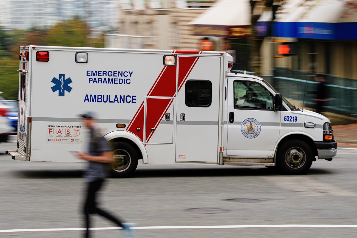 An ambulance speeds to an emergency call in Vancouver, B.C. on Thursday, October 1, 2020.