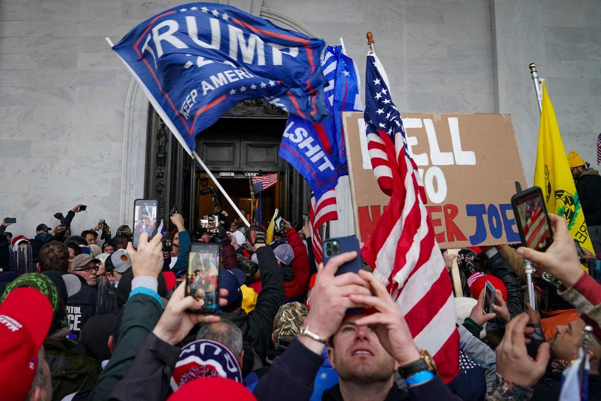 FILE - In this Jan. 6, 2021, file photo, Trump supporters gather outside the Capitol in Washington.