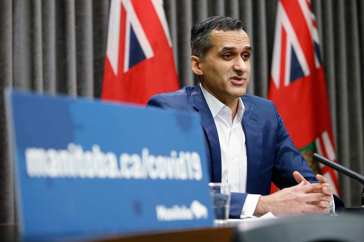 Dr. Jazz Atwal, Manitoba deputy chief provincial public health officer, speaks about COVID-19 updates, initiatives and answers media questions during a COVID-19 live-streamed press conference at the Manitoba legislature in Winnipeg Friday, March 5, 2020. THE CANADIAN PRESS/John Woods.