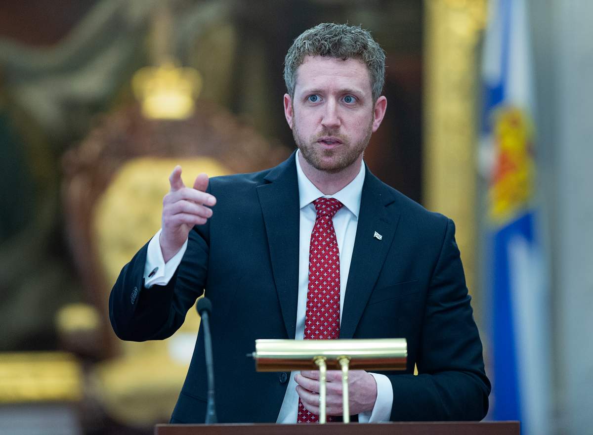 Nova Scotia Premier Iain Rankin takes questions from reporters after the speech from the throne at the legislature in Halifax on Tuesday, March 9, 2021.