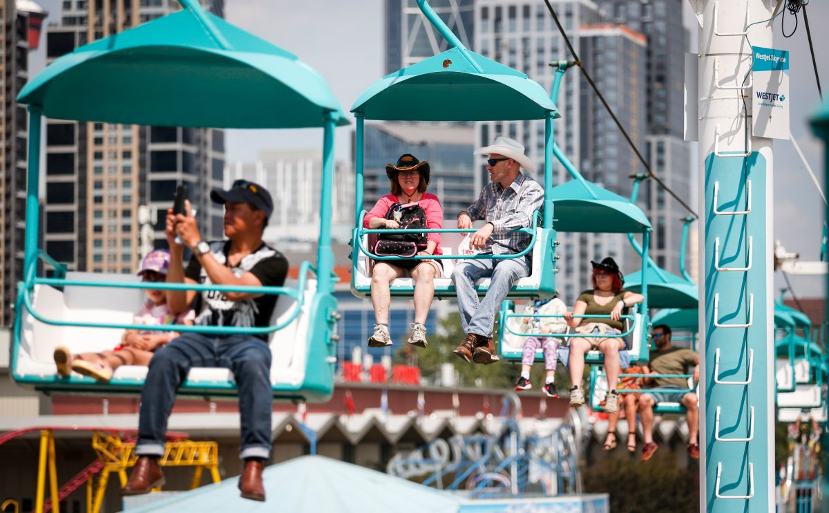 Visitors take the skyride for a high angle view during the Calgary Stampede in Calgary, Friday, July 9, 2021. THE CANADIAN PRESS/Jeff McIntosh.