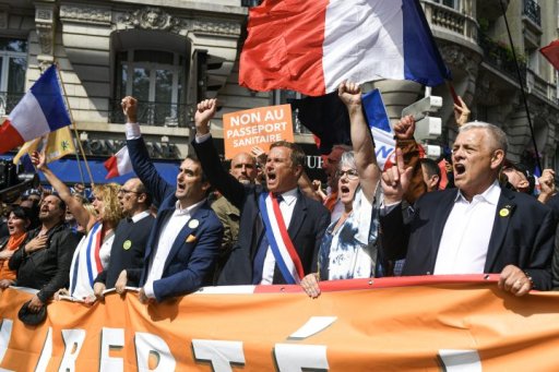 Francis Lalanne (l), Martine Wonner, Fabrice Di Vizio, Florian Philippot, Nicolas Dupont-Aignan and Jacline Mouraud during the anti sanitary pass demonstration at the initiative of Florian Philippot ‘s political party “les patriotes” in Paris, France on July 17, 2021.