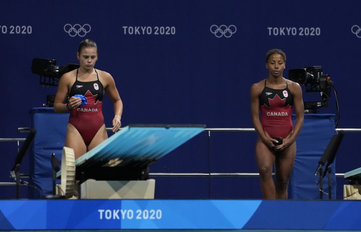 Jennifer Abel and Melissa Citrini Beaulieu of Canada prepare to compete during the Women’s Synchronized 3m Springboard Final at the Tokyo Aquatics Centre at the 2020 Summer Olympics, Sunday, July 25, 2021, in Tokyo, Japan.