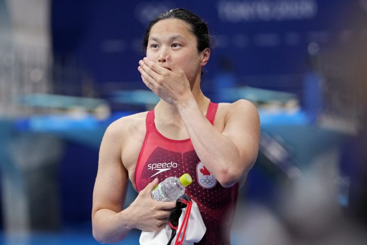 The new Canadian mark in the 100-metre butterfly comes a day after Maggie Mac Neil set a world record in the 50-metre backstroke.