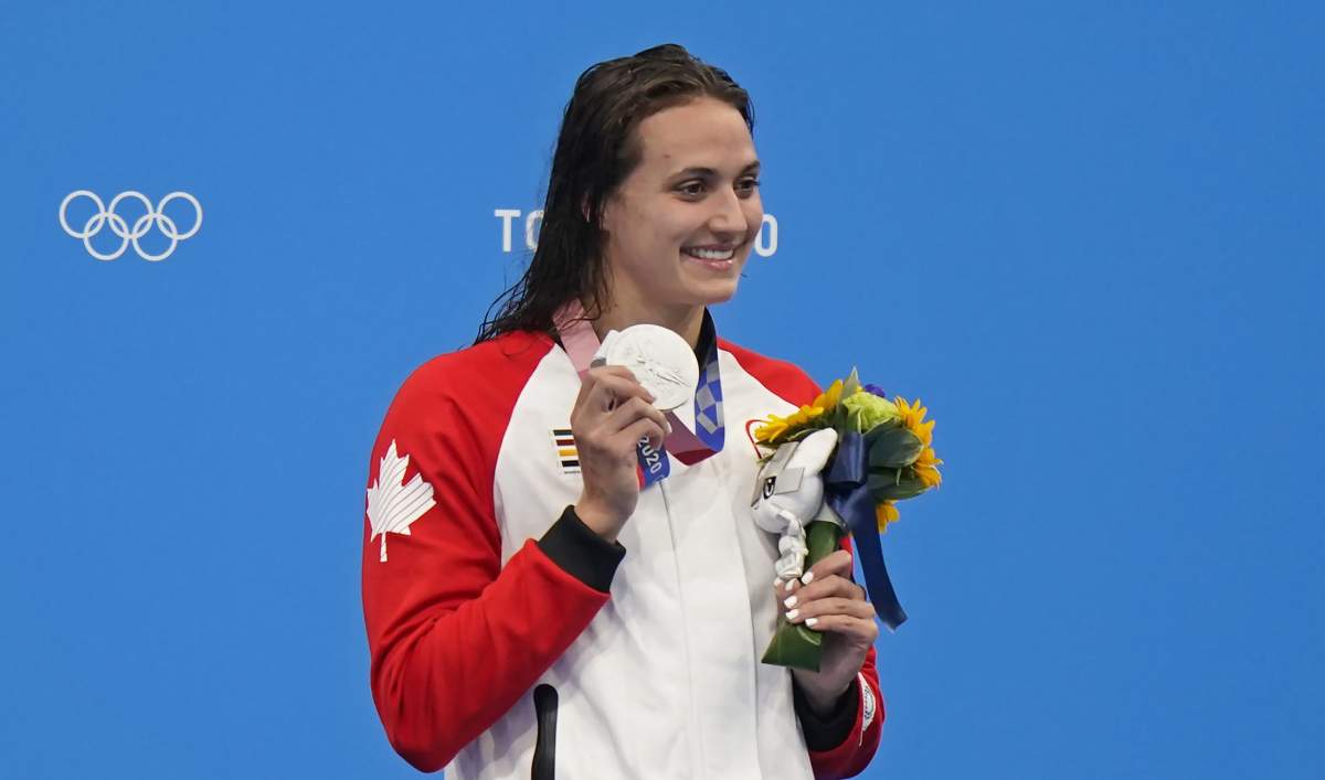 Canada's Kylie Masse celebrates a silver medal in the women's 200m backstroke final during the Tokyo Summer Olympic Games, in Tokyo, Saturday, July 31, 2021. THE CANADIAN PRESS/Adrian Wyld.