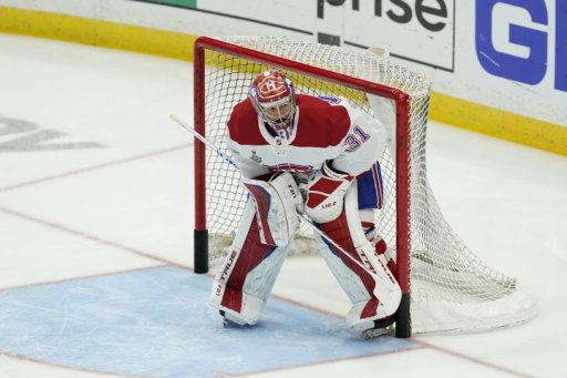 Montreal Canadiens goaltender Carey Price watches from the net during pregame of Game 5 of the NHL hockey Stanley Cup finals against the Tampa Bay Lightning, Wednesday, July 7, 2021, in Tampa, Fla.