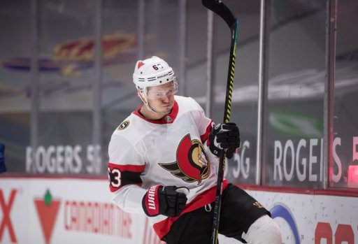 Ottawa Senators’ Evgenii Dadonov, of Russia, celebrates his goal against the Vancouver Canucks during the third period of an NHL hockey game in Vancouver, on Saturday, April 24, 2021.