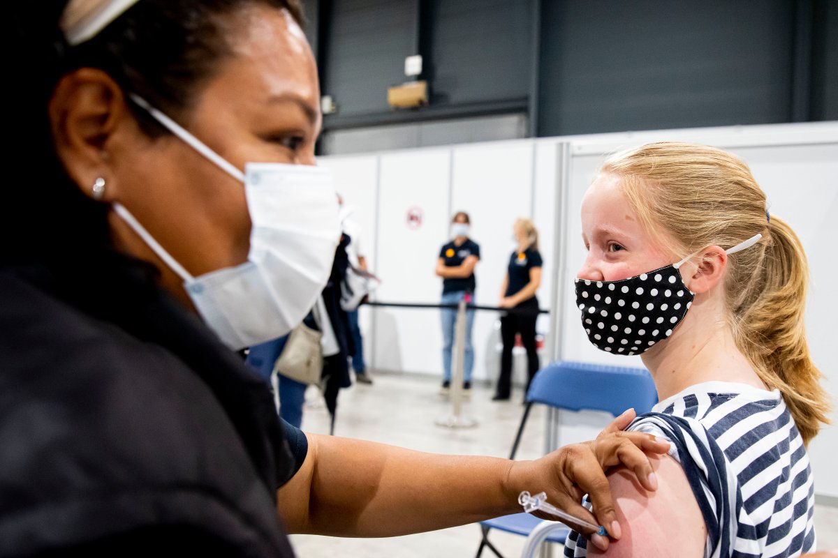 A child is seen while receiving a coronavirus vaccination on July 9, 2021 in Utrecht, Netherlands.