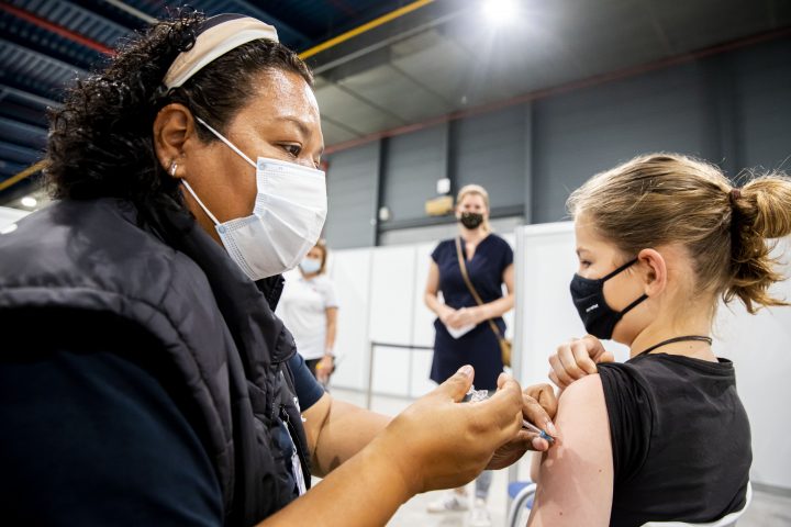 UTRECHT, NETHERLANDS - JULY 9: A child is seen while receiving a coronavirus vaccination on July 9, 2021 in Utrecht, Netherlands. (Photo by Patrick van Katwijk/BSR Agency/Getty Images).