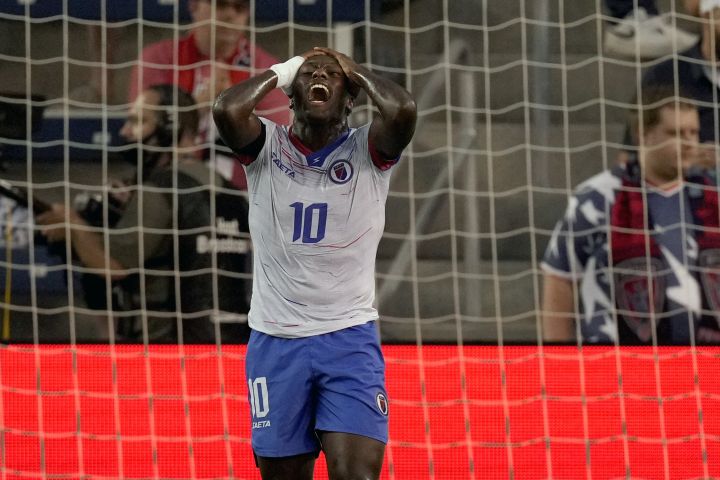 Haiti midfielder Derrick Ettiene Jr. reacts after missing a goal during the first half of a CONCACAF Gold Cup soccer match against the United States, Sunday, July 11, 2021, in Kansas City, Kan. 