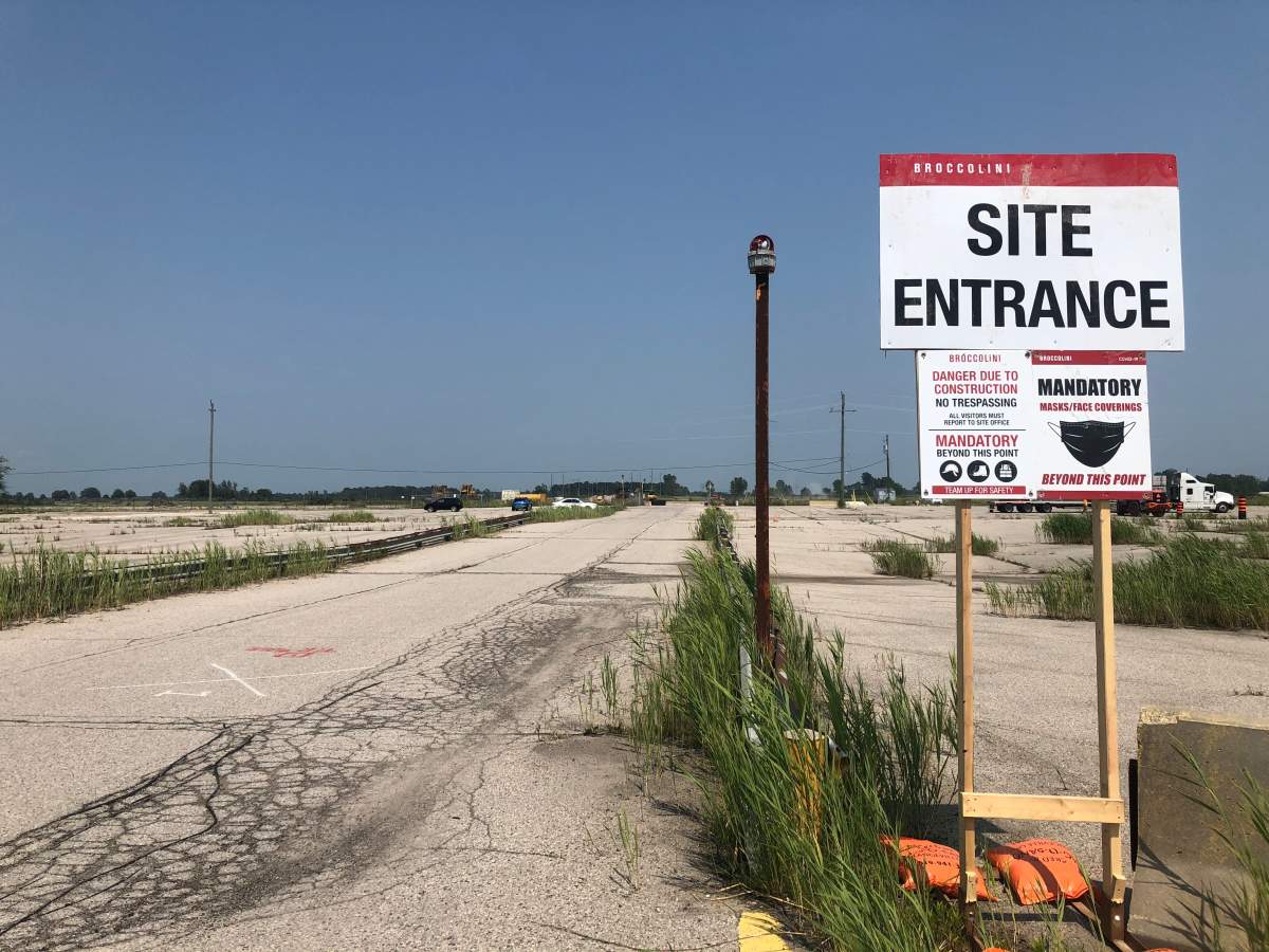 A sign marks the entrance to a Broccolini construction site at the land of a former Ford assembly plant in Talbotville, Ont. on July 5, 2021.