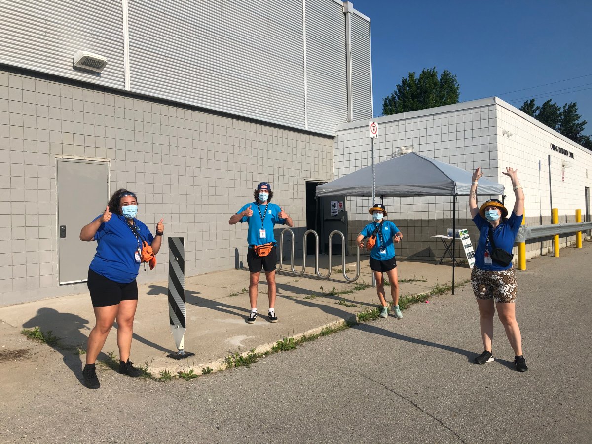 Camp staff get ready for the day outside of Carling Recreation Centre, one of several locations offering summer day camp from the City of London.