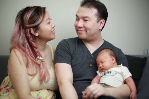 Suzi Au with her husband and newborn (Photo supplied)