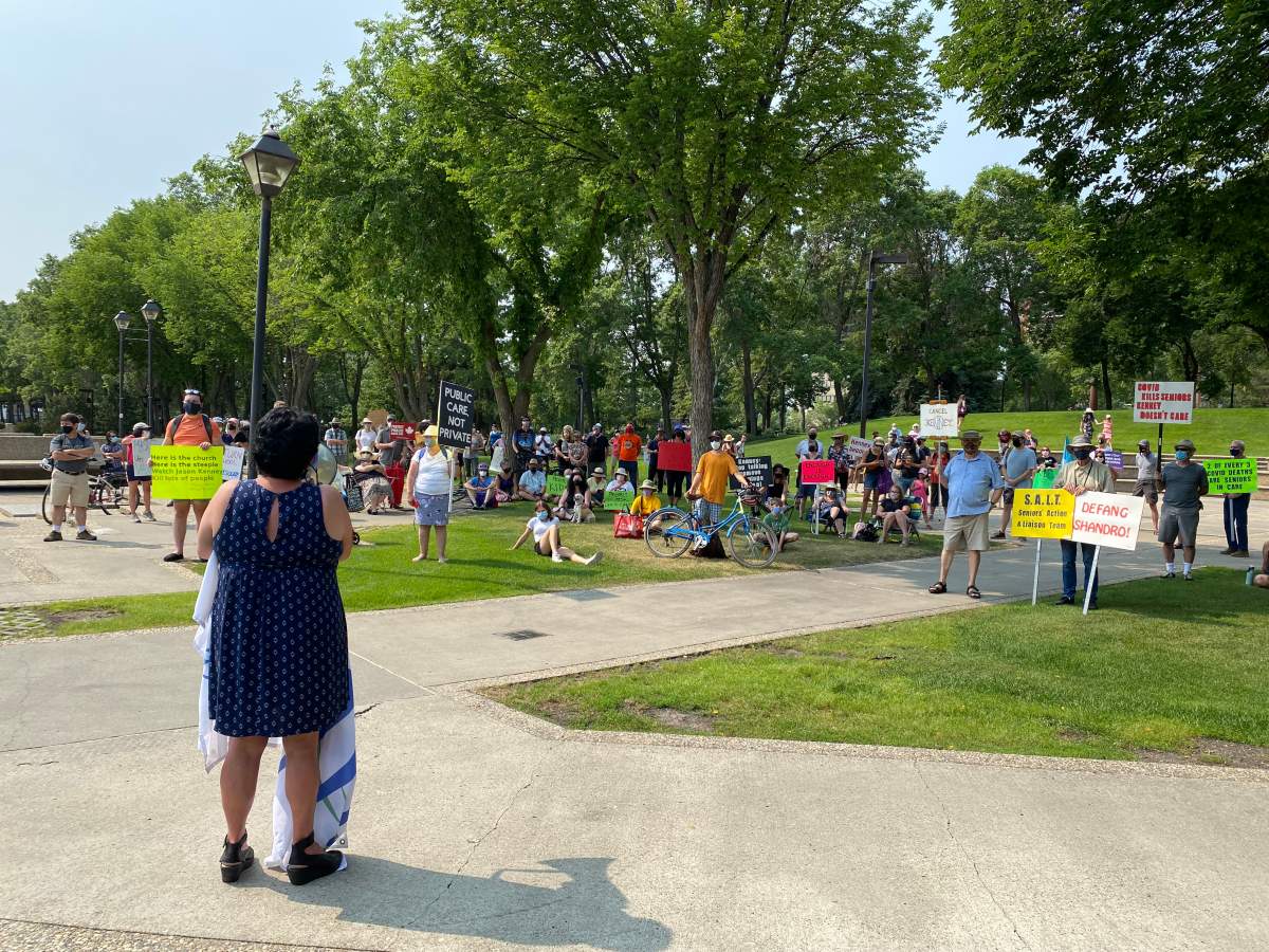 People protest the Alberta government’s COVID-19 rule rollback at the legislature on Saturday, July 31, 2021.