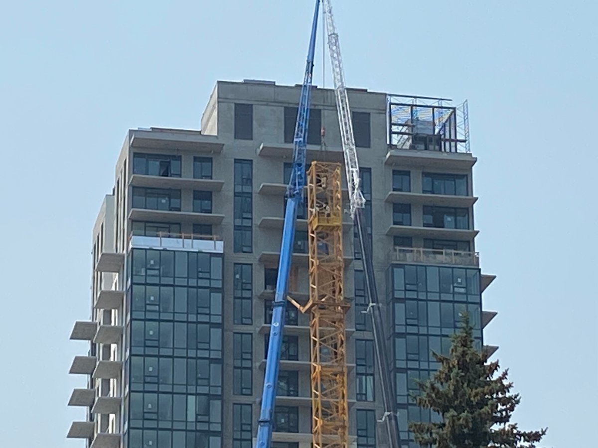 Central Okanagan Emergency Operations says the evacuation order was amended because the first stage of disassembling the collapsed crane was completed.